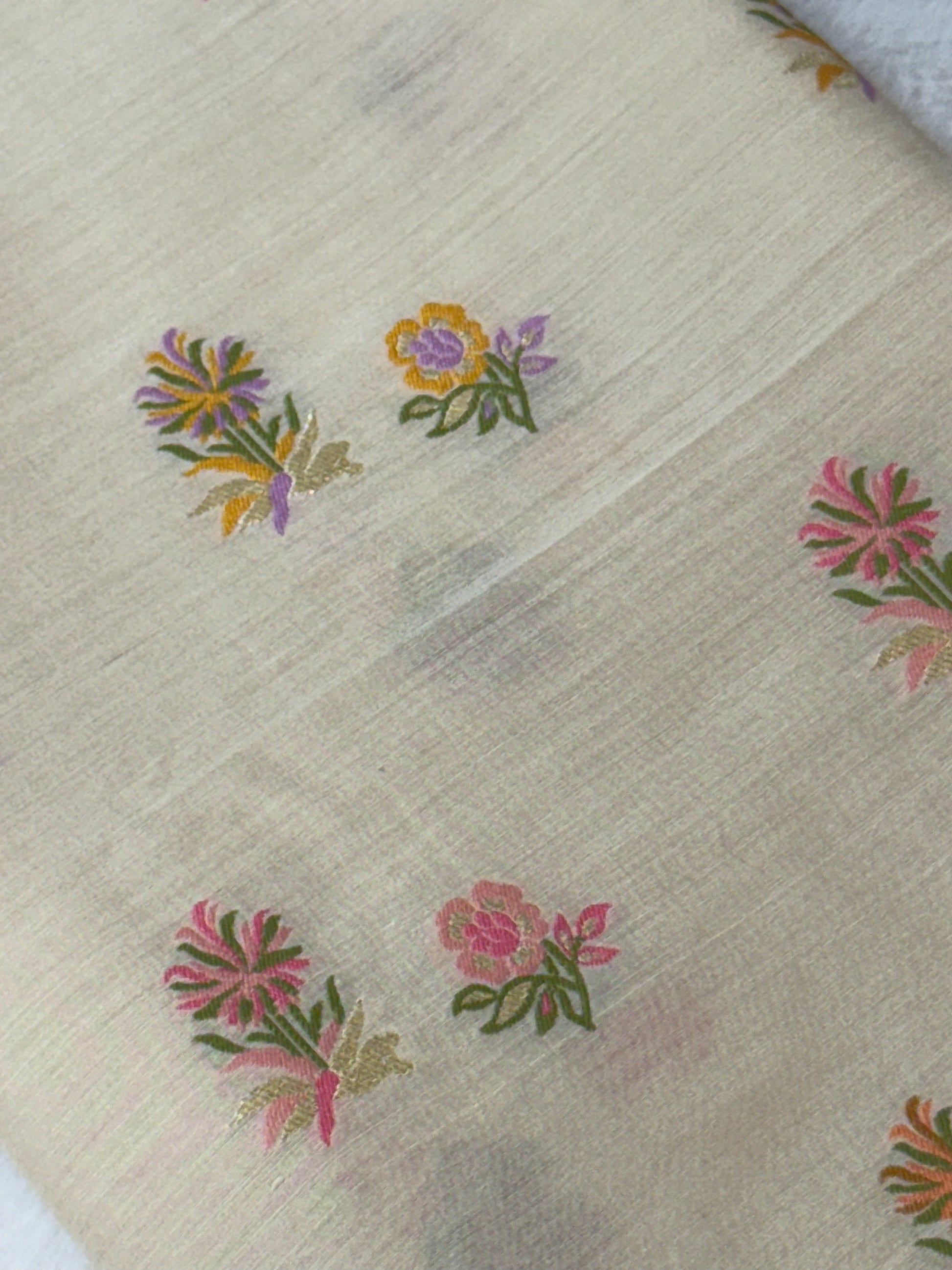 pure muga silk fabric wih delicate floral bootas